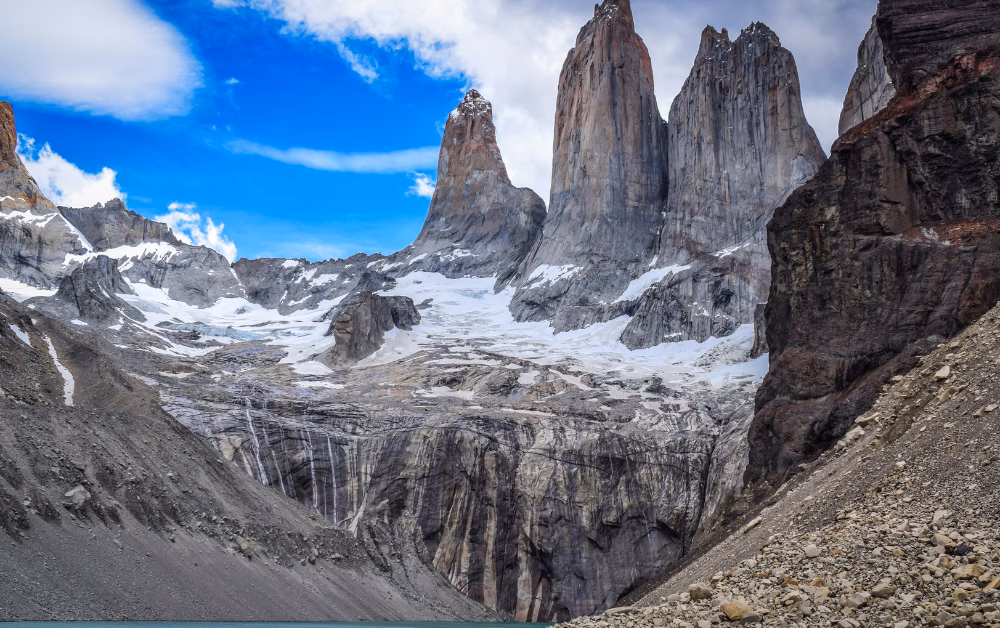 Landscape photo of mountain peaks and turquoise lake in Patagonia, Chile