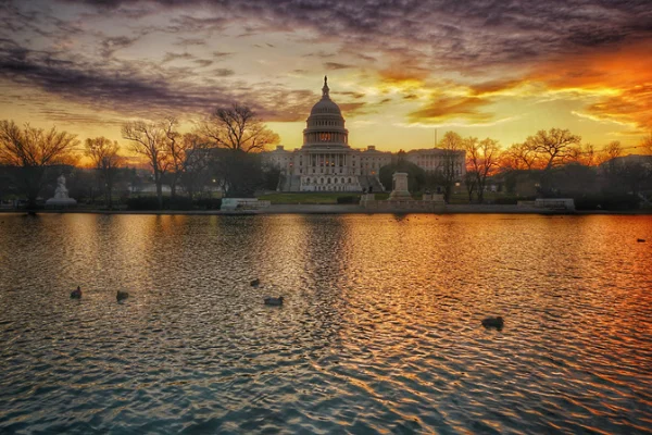 Sunrise at the Capitol Reflecting Pool of US Capitol Building